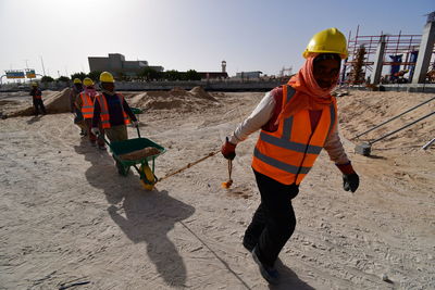 Workers working on construction site