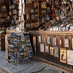 Stack of books in shelf at market