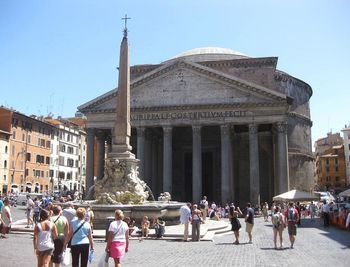 Tourists in front of historic building