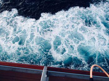 High angle view of surf on sea
