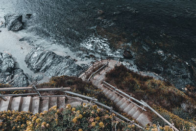 High angle view of dam against sea