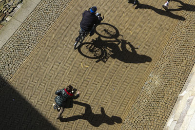 Shadow of woman on road