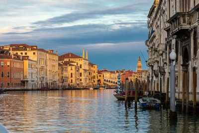 Canal passing through city buildings