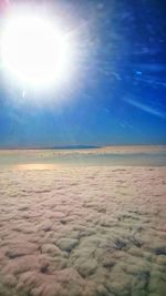 Sun shining through clouds