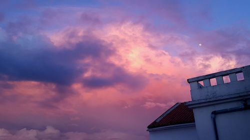 High section of building against cloudy sky