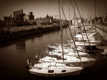 Boats moored at harbor