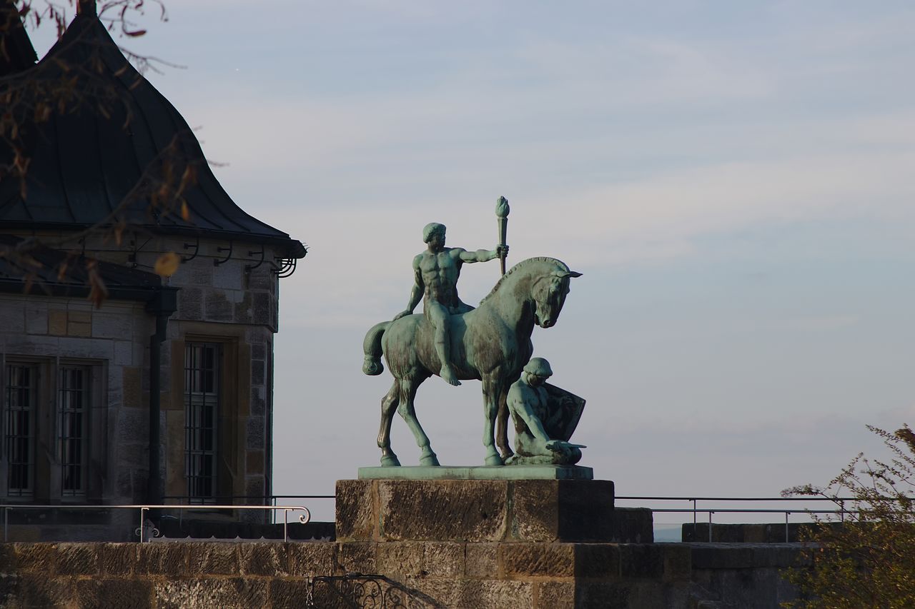 architecture, art and craft, statue, sculpture, sky, built structure, representation, no people, human representation, building exterior, creativity, mammal, nature, history, day, the past, male likeness, low angle view, outdoors