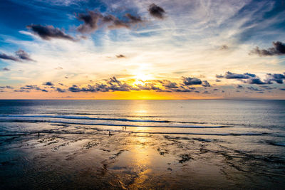 Scenic view of sea against sky at sunset