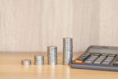 Close-up of coins on table