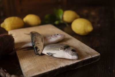 Close-up of fish on cutting board