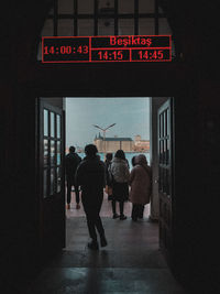 People walking on street at night