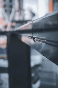 Close-up of pipe on window