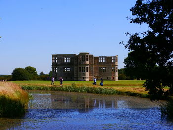 Scenic view of park against clear sky