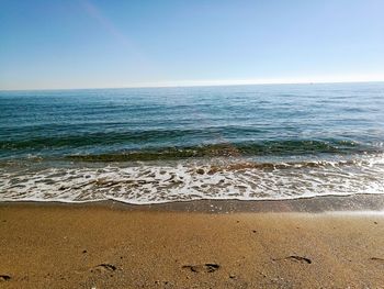 Scenic view of sea against clear sky