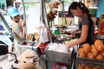 Man working at market stall