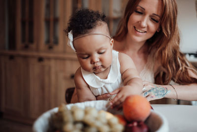 Portrait of happy mother and daughter