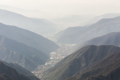 Scenic view of mountains against sky during winter