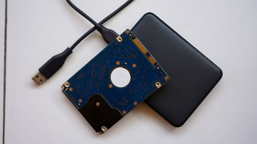 High angle view of mobile phone on table