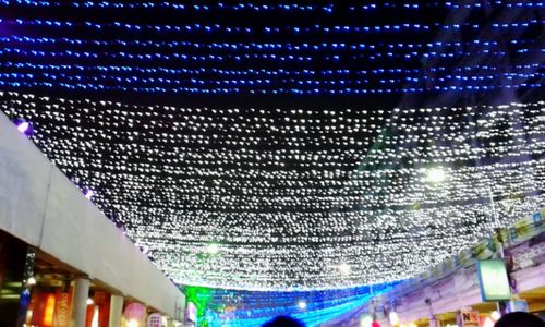 Low angle view of illuminated lights