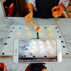 High angle view of person preparing food on table