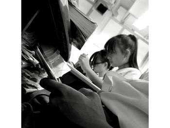 Close-up of girl sitting at home