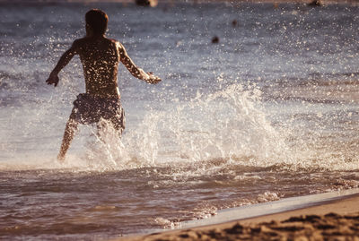 Man surfing in sea