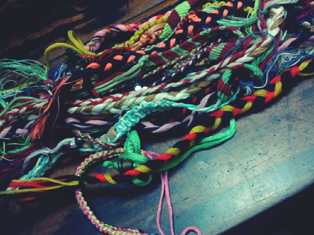 indoors, multi colored, animal themes, high angle view, art and craft, blue, art, creativity, close-up, fish, animal representation, no people, colorful, pattern, one animal, rope, variation, sea life, underwater