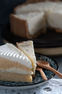 Close-up of cake slice in plate on table