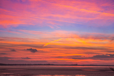 Scenic view of dramatic sky during sunset