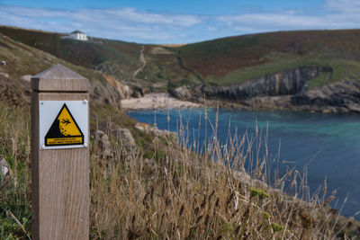 Danger to life sign post with beautiful scenery 