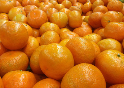 Full frame shot of oranges at market stall