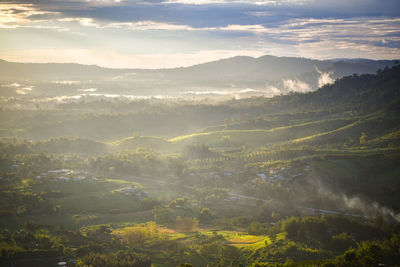 Aerial view of landscape against sky during sunset