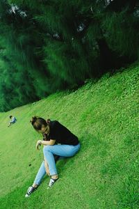 High angle view of woman and boy on field