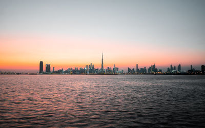View of buildings against sky during sunset