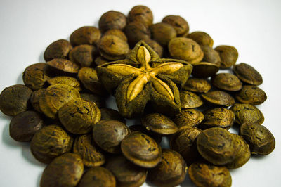 Close-up of beans against white background