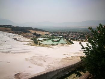 High angle view of swimming pool against sky