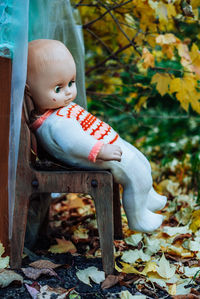 Full length of cute baby girl in autumn