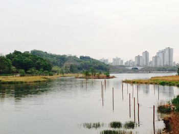 River by city against clear sky