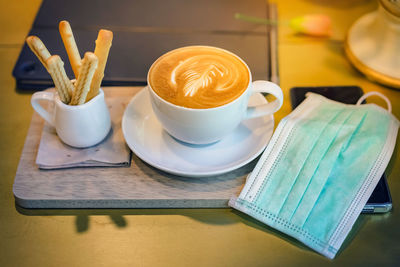 High angle view of coffee on table