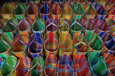 Full frame shot of multi colored bags for sale at market stall