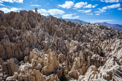 Panoramic view of rocky mountains against sky