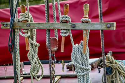 Close-up of chain tied up on metal boat