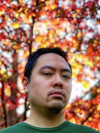 Portrait of young man looking away