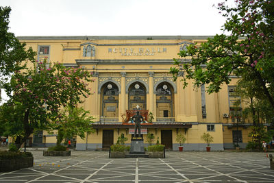 People in front of building