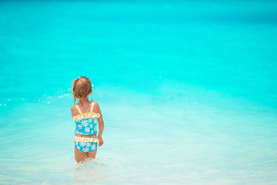 Full length of woman in swimming pool