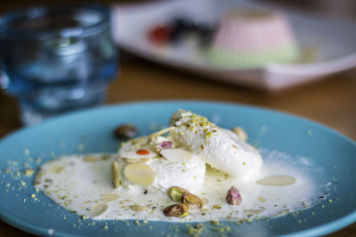 Close-up of ras malai served in plate on table