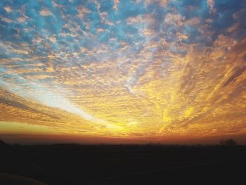 Scenic view of silhouette landscape against sky during sunset