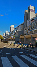 City street against clear blue sky