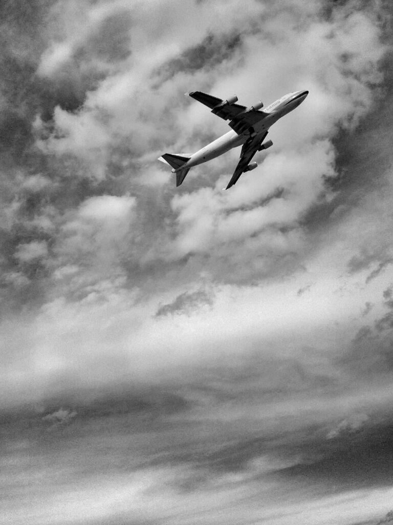 airplane, flying, sky, air vehicle, cloud - sky, low angle view, mode of transport, transportation, cloudy, mid-air, cloud, nature, outdoors, on the move, day, weather, travel, no people, journey, aircraft wing