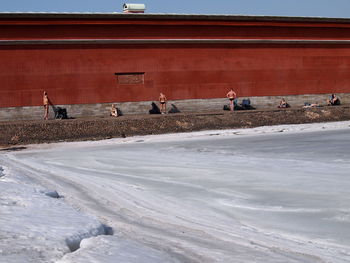 People on snow covered land